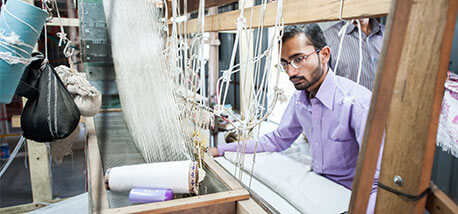 People-making-colorful-silk-yarn-fabric