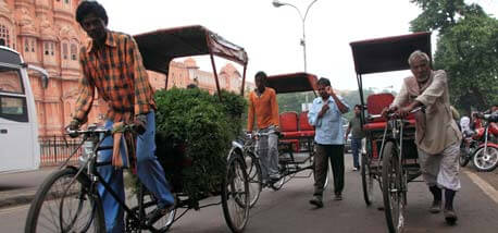 cycle-rickshaw-puller-transport-vegetables-through-the-city